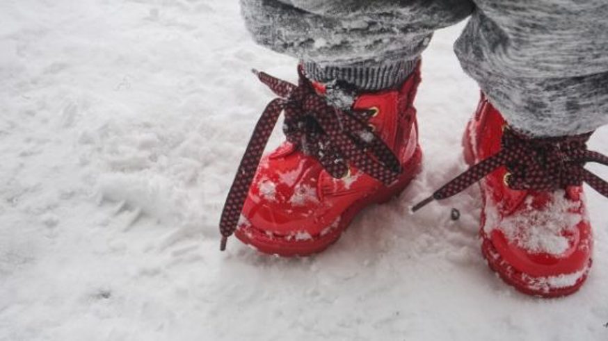 winter proofing yourself with red boots in the snow