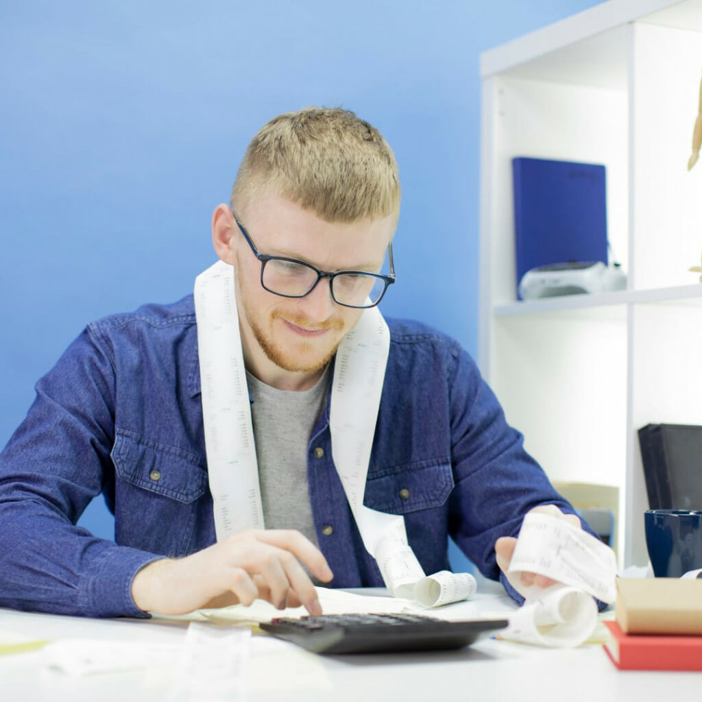 Spend Money on other expenditure - man counting finances 